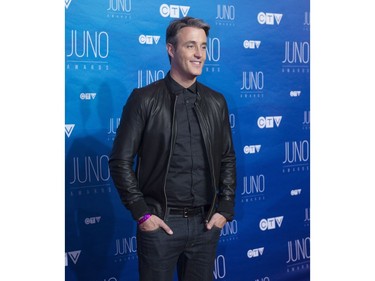 Ben Mulroney poses on the red carpet as he arrives at the Juno Awards show, Sunday, April 2, 2017 in Ottawa.