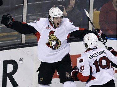 The Ottawa Senators' Bobby Ryan, left, is congratulated by Derick Brassard after his goal during the third period of Game 4 in Boston on Wednesday, April 19, 2017.