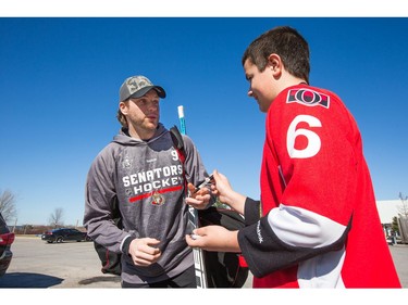 Bobby Ryan stops to sign an autograph for Dylan Sullivan as the Ottawa Senators practice at the Bell Sensplex in advance of their next NHL playoff game against the Boston Bruins on Saturday. The Bruins are up 1-0 in a best of seven series.