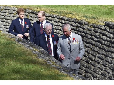 Britain's Charles , Prince of Wales, right, Britain's Prince William, Duke of Cambridge, 2nd left, and Britain's Prince Harry, left, visit the Canadian National Vimy Memorial in Vimy, near Arras, northern France, as part of the commemorations of the 100th anniversary of the Battle of Vimy Ridge, a World War I battle which was a costly victory for Canada but one that helped shape the former British colony's national identity, Sunday, April 9, 2017.