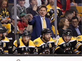 The Boston Bruins received a spark when Bruce Cassidy, middle, took over as head coach, Senators GM Pierre Dorion said Monday.