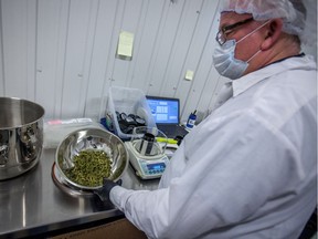 Cannabis products are packaged and labelled at Tweed in Smith Falls, Ont. Photo by Chris Donovan