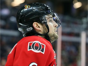 Chris Wideman of the Ottawa Senators looks up at the replay after the Boston Bruins scored their second goal during second period of NHL action held at Canadian Tire Centre in Ottawa, April 21, 2017.