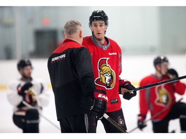 Coach Marc Crawford chats with Kyle Turris as the Ottawa Senators practice at the Bell Sensplex in advance of their next NHL playoff game against the Boston Bruins on Saturday. The Bruins are up 1-0 in a best of seven series.