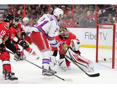 Craig Anderson looks back at the Rangers' third goal in the second period.