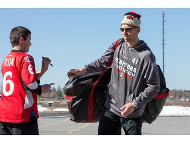 Craig Anderson signs an autograph for Dylan Sullivan as the Ottawa Senators practice at the Bell Sensplex in advance of their next NHL playoff game against the Boston Bruins on Saturday. The Bruins are up 1-0 in a best of seven series.