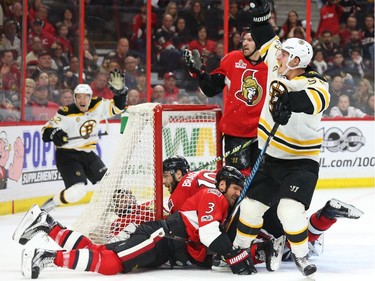 The Bruins begin to celebrate what they think is an overtime goal, but it was eventually disallowed.