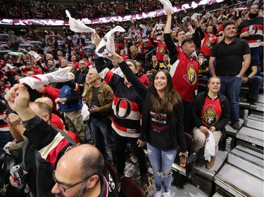 Fans wave their rally towels after Bobby Ryan scores in the second period.