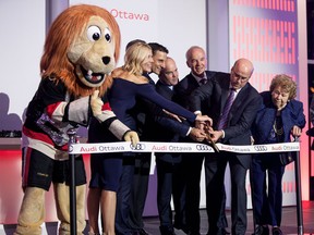 A ribbon-cutting with Spartacat.