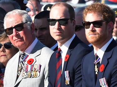 (LtoR) Britain's Charles, Prince of Wales, Britain's Prince William, Duke of Cambridge and Britain's Prince Harry, attend a commemoration ceremony at the Canadian National Vimy Memorial in Vimy, near Arras, northern France, on April 9, 2017, marking the 100th anniversary of the Battle of Vimy Ridge,