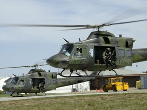 Griffon helicopters take off on a mission. DND photo.