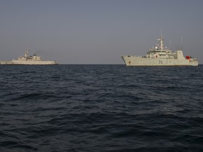 This file photo shows the Royal Moroccan Navy Frigate, Hassan II, and HMCS Summerside sailing side by side, off the coast of Sierra Leone, during Neptune Trident 17-01, on March 26, 2017. Photo: MCpl Pat Blanchard, Canadian Forces.