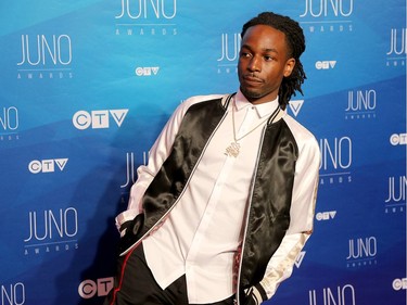 Jazz Cartier poses as musical talent take to the red carpet at the Juno Awards held on Sunday at the Canadian Tire Centre.