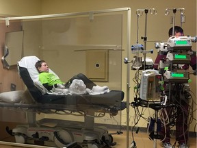 Jonathan Pitre is seen just before undergoing full-body radiation on Wednesday, April 12, 2017 at the University of Minnesota Masonic Children's Hospital. He'll have his second stem-cell transplant on Thursday.