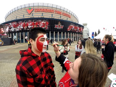 Julian Scheiner has his face painted in the Red Zone.