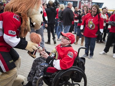Justin Greer chats with Spartacat at the Canadian Tire Centre before Game 2.