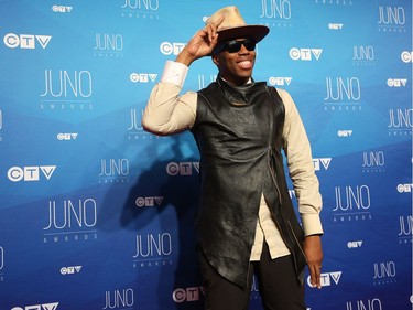 Kardinal Offishall poses as musical talent take to the red carpet at the Juno Awards held on Sunday at the Canadian Tire Centre.