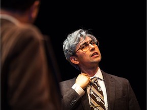 Kelly Wong plays the role of John Crosbie during rehearsal for the play 1979 at the Great Canadian Theatre Company. (Photo by Chris Donovan)