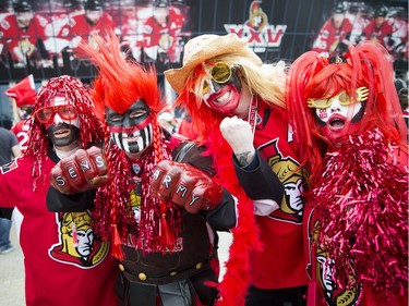 From left, Carmel Bourgeois, Steve Barnett, Tyler Millar and Jennifer Barnett at the Canadian Tire Centre before Game 2.