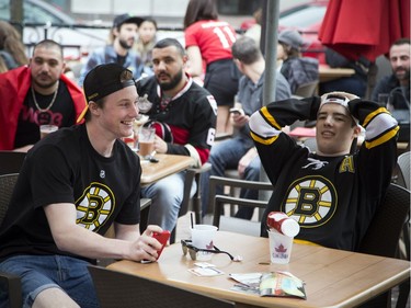 L-R Lake Korte-Moore and Liam Lively two of the few Boston fans along Sens Mile at St. Louis Bar and Grill on Elgin Sunday April 23, 2017.   Ashley Fraser/Postmedia