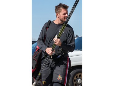 Marc Methot with his injured left pinky finger bandaged up heads into the arena as the Ottawa Senators practice at the Bell Sensplex in advance of their next NHL playoff game against the Boston Bruins on Saturday. The Bruins are up 1-0 in a best of seven series.