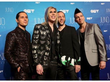 Marianas Trench pose as musical talent take to the red carpet at the Juno Awards held on Sunday at the Canadian Tire Centre.