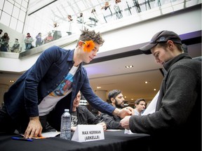 Max Kerman of Arkells signs Cody Jacobs shirt at The Rideau Centre Saturday April 1, 2017 as the Juno's Fan Fare took place.