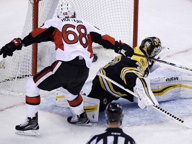 Mike Hoffman pulls a deke to beat Tukka Rask following a long-bomb pass from Erik Karlsson.