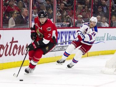 New York Rangers #24 tries to catch Ottawa Senators #2 Dion Phaneuf during the second period of play at Canadian Tire Centre Saturday April 8, 2017.