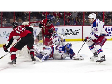 New York Rangers goalie Henrik Lundqvist makes a save.