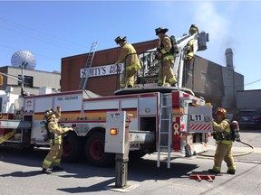 Ottawa Fire on the scene of Scotty's Auto Body fire on Gladstone Ave Monday April 24, 2017.
