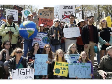 Ottawa residents concerned about climate, jobs and justice take part in a march to the United States embassy in Ottawa on Saturday, April 29, 2017.   (Patrick Doyle)  ORG XMIT: 0430 climate 12