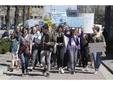 Ottawa residents concerned about climate, jobs and justice take part in a march to the United States embassy in Ottawa on Saturday, April 29, 2017.   (Patrick Doyle)  ORG XMIT: 0430 climate 05