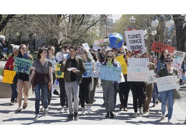 Ottawa residents concerned about climate, jobs and justice take part in a march to the United States embassy in Ottawa on Saturday, April 29, 2017.   (Patrick Doyle)  ORG XMIT: 0430 climate 06