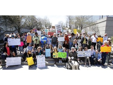 Ottawa residents concerned about climate, jobs and justice take part in a march to the United States embassy in Ottawa on Saturday, April 29, 2017.   (Patrick Doyle)  ORG XMIT: 0430 climate 10