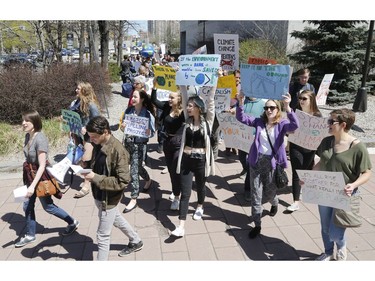 Ottawa residents concerned about climate, jobs and justice take part in a march to the United States embassy in Ottawa on Saturday, April 29, 2017.   (Patrick Doyle)  ORG XMIT: 0430 climate 07