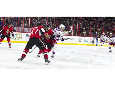 Ottawa Senators battle the New York Rangers during the second period of play at Canadian Tire Centre Saturday April 8, 2017.