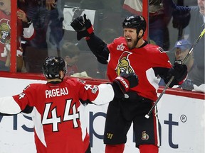 Ottawa Senators defenceman Marc Methot celebrates his Game 2 goal with Senators centre Jean-Gabriel Pageau.
