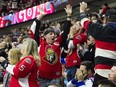 Ottawa Senators fans react after a goal in the second period against the New York Rangers at Canadian Tire Centre Saturday April 8, 2017.