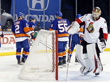 Ottawa Senators goalie Mike Condon (1) reacts after giving up a goal to New York Islanders left wing Anders Lee (27) in the second period of an NHL hockey game, Sunday, April 9, 2017, in New York.