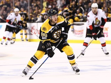 David Pastrnak of the Boston Bruins skates against the Ottawa Senators during the first period.