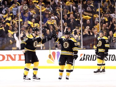 Drew Stafford #19 of the Boston Bruins celebrates with Brad Marchand #63 after scoring against the Ottawa Senators during the first period of Game Six of the Eastern Conference First Round against the Ottawa Senators during the 2017 NHL Stanley Cup Playoffs at TD Garden on April 23, 2017 in Boston, Massachusetts.
