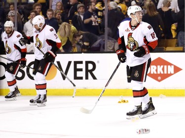 BOSTON, MA - APRIL 23:  Ryan Dzingel #18 of the Ottawa Senators looks out for beer cans being thrown onto the ice after the Senators defeat the Boston Bruins 3-2 in overtime of Game Six of the Eastern Conference First Round during the 2017 NHL Stanley Cup Playoffs at TD Garden on April 23, 2017 in Boston, Massachusetts.