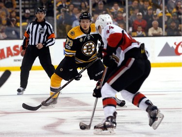 Charlie McCoy #73 of the Boston Bruins defends against Jean-Gabriel Pageau #44 of the Ottawa Senators in the first period against the Boston Bruins in Game Three of the Eastern Conference First Round during the 2017 NHL Stanley Cup Playoffs at TD Garden on April 17, 2017 in Boston, Massachusetts.