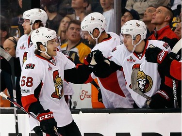 Mike Hoffman of the Ottawa Senators celebrates his goal with teammates in the first period against the Boston Bruins in Game Three.