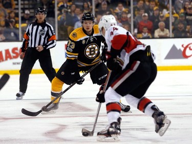 Charlie McCoy #73 of the Boston Bruins defends against Jean-Gabriel Pageau #44 of the Ottawa Senators in the first period against the Boston Bruins in Game Three of the Eastern Conference First Round during the 2017 NHL Stanley Cup Playoffs at TD Garden on April 17, 2017 in Boston, Massachusetts.