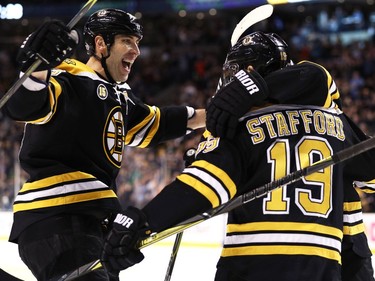 BOSTON, MA - APRIL 6: Drew Stafford #19 of the Boston Bruins celebrates with Zdeno Chara #33 after he scored against the Ottawa Senators during the first period at TD Garden on April 6, 2017 in Boston, Massachusetts.