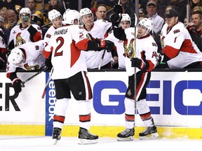 The Senators' Alex Burrows celebrates with Dion Phaneuf after scoring against the Bruins in Boston on Thursday, April 6, 2017.