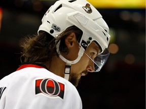 Erik Karlsson #65 of the Ottawa Senators looks while playing the Detroit Red Wings during the first period at Joe Louis Arena on April 3, 2017 in Detroit, Michigan.