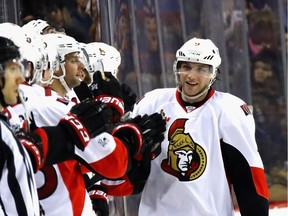 Bobby Ryan celebrates with teammates after scoring the Senators' first goal of the game on Sunday against the Islanders.